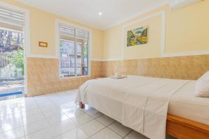 Postel nebo postele na pokoji v ubytování Homestay Lucu 2 + 22 fotografií