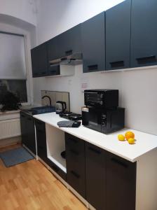 Kuchyňa alebo kuchynka v ubytovaní OWR Relax - Hostel położony blisko atrakcji turystycznych