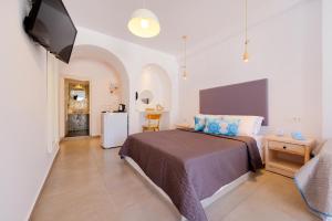 Voodi või voodid majutusasutuse Sigalas Beach Hotel toas