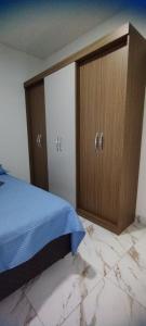 Postel nebo postele na pokoji v ubytování Morada dos eucaliptos