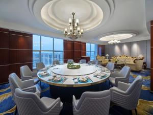 a conference room with a table and chairs at Jin Jiang International Hotel Taicang in Taicang