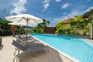 Bazén v ubytování Indochine Resort and Villas - SHA Extra Plus nebo v jeho okolí