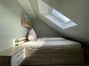 Postel nebo postele na pokoji v ubytování Landhaus Dünen