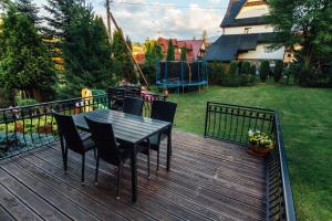 Vonkajšia záhrada v ubytovaní Apartament Zacisze Tatr