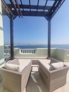Un lugar para sentarse en Mina Hotel and Residences By The Torch