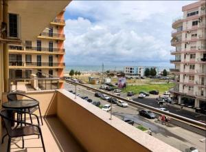 a balcony with a view of a city street at Summerland mamaia view in Mamaia
