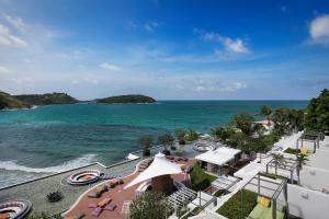 an aerial view of the beach and the ocean at The Nai Harn in Nai Harn Beach