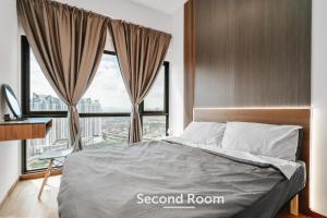 a bedroom with a bed and a large window at Nowhere 2BR & 2Bath Apartment with Balcony @ Reizz Residences in Kuala Lumpur
