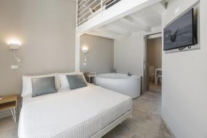 Katil atau katil-katil dalam bilik di Villa la Duccia - Homelike Villas
