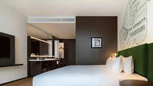 Cama o camas de una habitación en Hampton by Hilton Shenzhen Nanshan Science and Technology Park