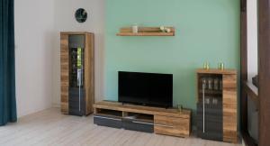TV a/nebo společenská místnost v ubytování Ferienhaus Blick zur Ahr