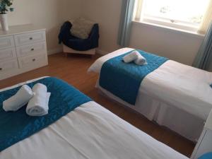Postel nebo postele na pokoji v ubytování Elmbank Accommodation