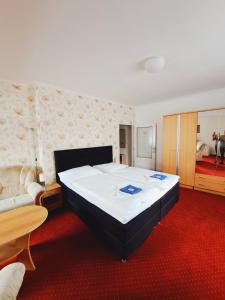 Posteľ alebo postele v izbe v ubytovaní Hotel Grand
