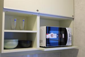 Dapur atau dapur kecil di S.P.C Apartment by Brodderud