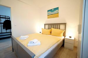 Ein Bett oder Betten in einem Zimmer der Unterkunft Haus Vilma