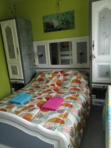 Кровать или кровати в номере Christophe