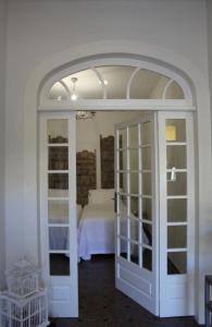 A bed or beds in a room at Ciudad Jardín Marina