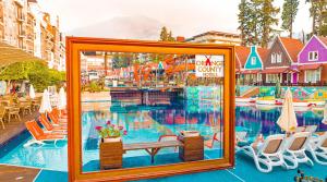 a picture of a pool at a resort at Orange County Kemer Family Concept in Kemer