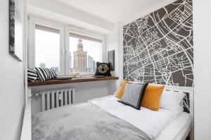 Posteľ alebo postele v izbe v ubytovaní Chmielna 35 - City View Apartment by Noclegi Renters