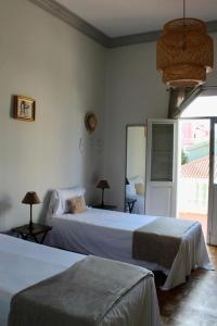 A bed or beds in a room at Ciudad Jardín Marina