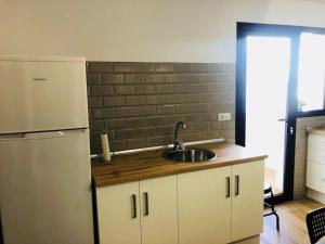 Kuchyň nebo kuchyňský kout v ubytování Posada de la Judería III + 49 fotografií