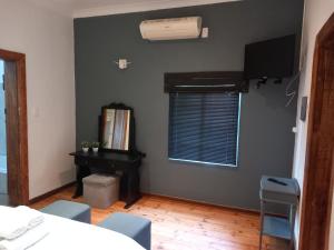 TV a/nebo společenská místnost v ubytování 7 On Grey Guesthouse