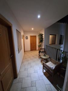TV a/nebo společenská místnost v ubytování Hostal Fenix