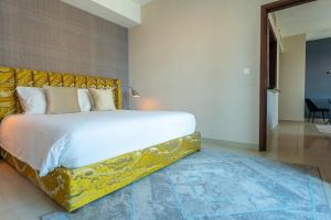 Postel nebo postele na pokoji v ubytování Bellavista - High Floor - 1BR 29 Boulevard - Burj Khalifa & Fountain View