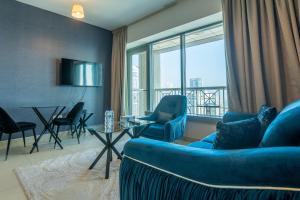 Posezení v ubytování Bellavista - High Floor - 1BR 29 Boulevard - Burj Khalifa & Fountain View