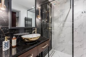 Kúpeľňa v ubytovaní Apartamenty DEO PLAZA by Rent like home