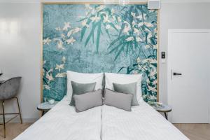 Posteľ alebo postele v izbe v ubytovaní Apartamenty DEO PLAZA by Rent like home