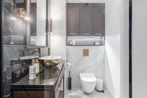 Kúpeľňa v ubytovaní Apartamenty DEO PLAZA by Rent like home