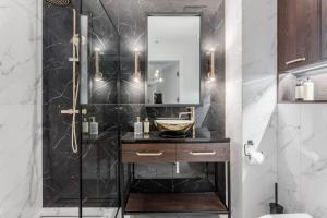 Kúpeľňa v ubytovaní Apartamenty DEO PLAZA by Rent like home