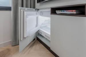 Posteľ alebo postele v izbe v ubytovaní Apartamenty DEO PLAZA by Rent like home