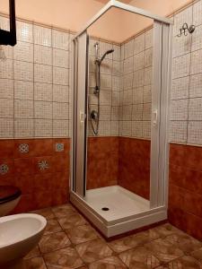 Koupelna v ubytování B&B Mannalà + 5 fotografií