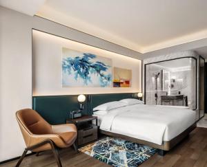 Voodi või voodid majutusasutuse Andaz Macau, By Hyatt toas