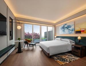 Voodi või voodid majutusasutuse Andaz Macau, By Hyatt toas