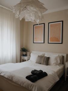 Un pat sau paturi într-o cameră la Verte House