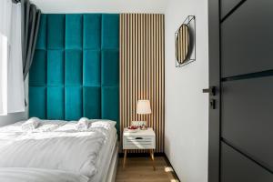 Posteľ alebo postele v izbe v ubytovaní Rent like home - Piaseckiego 24