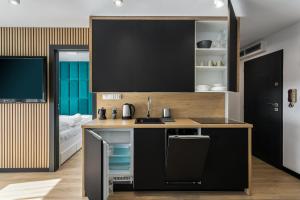 Kuchyňa alebo kuchynka v ubytovaní Rent like home - Piaseckiego 24
