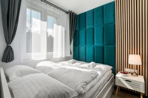 Posteľ alebo postele v izbe v ubytovaní Rent like home - Piaseckiego 24