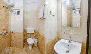 a bathroom with a sink and a toilet at FabHotel Triple Tree in Bhubaneshwar