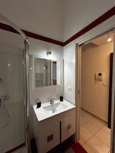 Ванна кімната в Al Piccone apartments