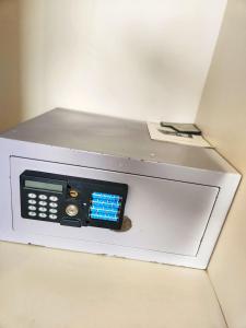 a machine with a calculator on top of it at Modern Townhouse Ocean Front in Adeje