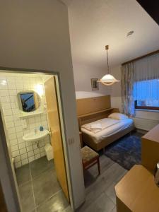 Postel nebo postele na pokoji v ubytování Krügers Hotel