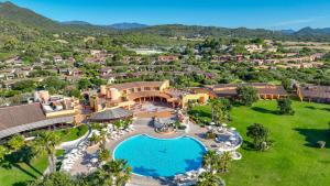 an aerial view of a resort with a swimming pool at Sant'Elmo Beach Hotel in Castiadas