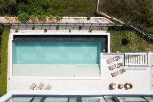 an overhead view of a swimming pool on a house at Villa Aurum ZadarVillas in Zadar