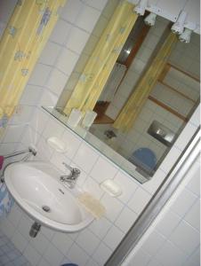 Kúpeľňa v ubytovaní Appartements Huber