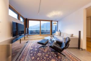 Posezení v ubytování Lakefront Suite 148 by we rent
