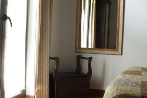 A bed or beds in a room at Apartamentos La Huertona